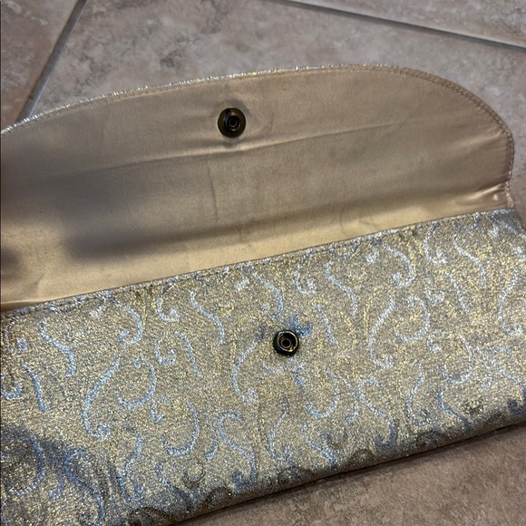 Elegant Silver and Gold Clutch with Intricate Design - Picture 2 of 3